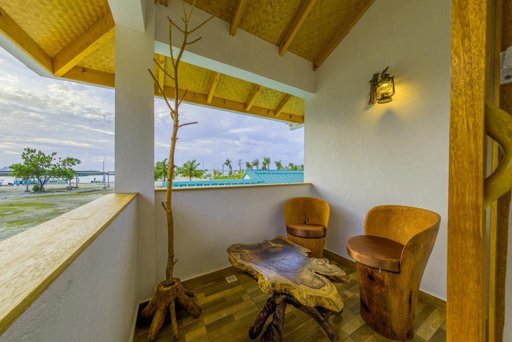 Ameera Maldives Dhiffushi Rum bild